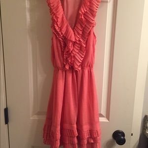Ruffle neck dress.